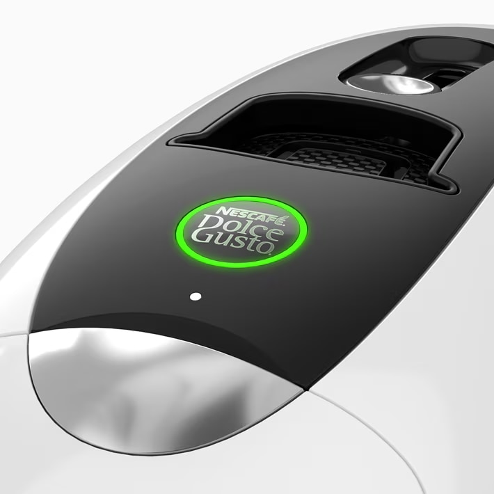 Machine NEO Latte blanche avec bouton de démarrage allumé en vert